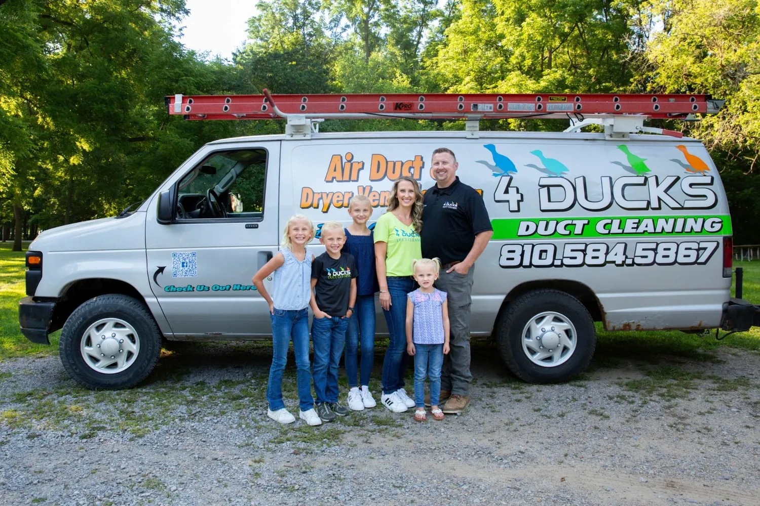 4 Ducks Duct Cleaning team on a dryer vent job