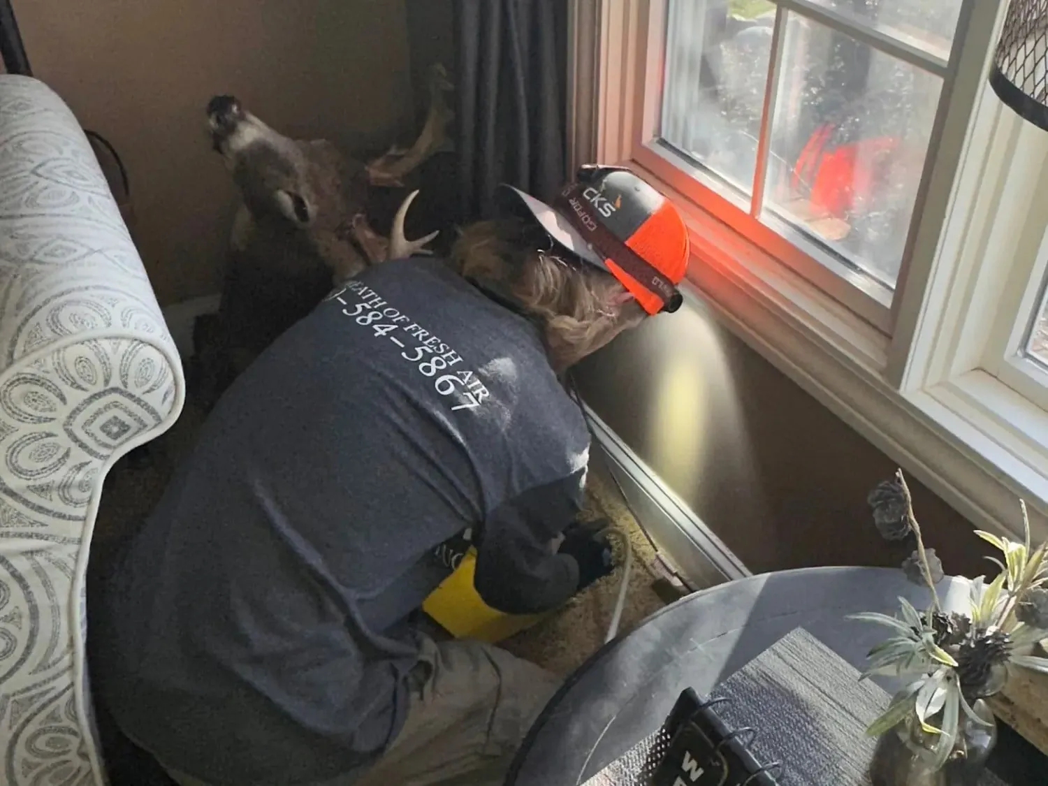 Cleaning a floor vent in Flushing